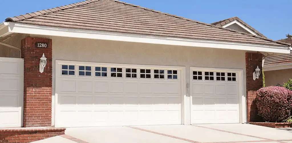 Residential garage door repair service for a double garage door in Mesa, AZ