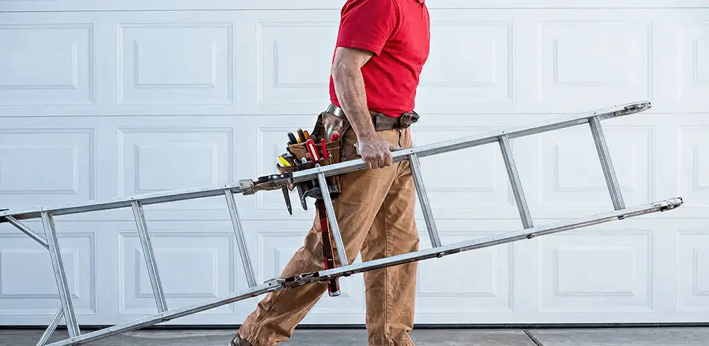 Garage door repair technician arriving with tools and ladder in Mesa, AZ
