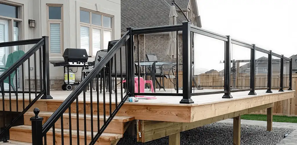 Handrail installation on a deck staircase for safety and code compliance in Mesa, AZ